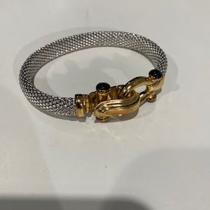 Silver bracelet gold buckle